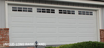 White garage door with long raised panel