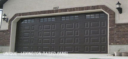 Dark brown garage door with lexington raised panel