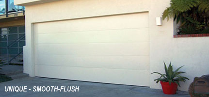 White garage door with smooth flush design